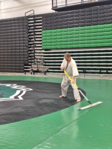 More of Rich cleaning the mats at summer camp