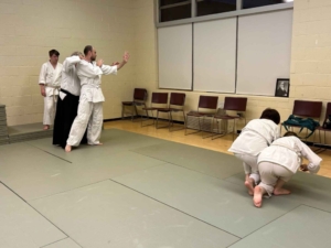 Read Fowler Sensei coaching, Amanda and Naoko practicing